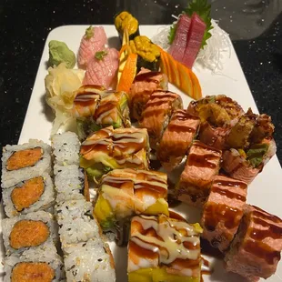 a platter of sushi and rolls