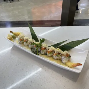 a plate of sushi on a table