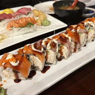 a plate of sushi and a bowl of rice