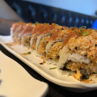 a plate of sushi rolls