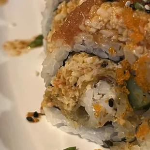 a closeup of a sushi roll on a plate