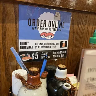 a sign for ordering sushi