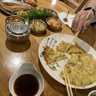 The Korean vegetable pancake was very good and so we're all the side dishes as you can see the mackerel serving is very generous as well.