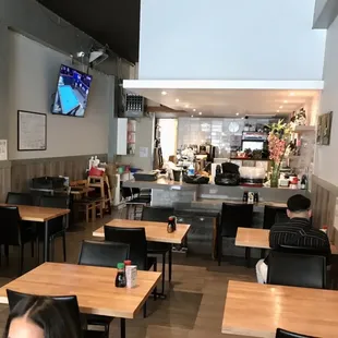the dining area of a sushi house