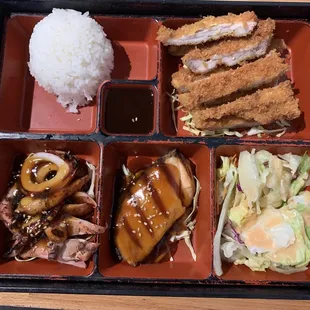 Happy Bento Box with teriyaki squid, teriyaki salmon and chicken katsu