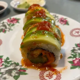 a sushi roll on a plate