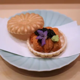 a plate of sushi on a table