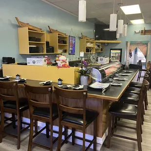 the dining area of a sushi restaurant