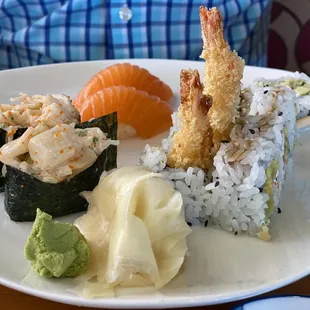 a plate of sushi and shrimp