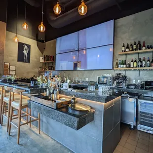 a modern kitchen with a bar