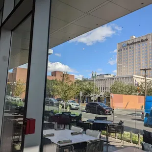 a view of a city from a restaurant