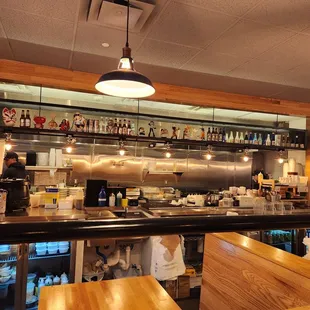 a view of the kitchen from the bar