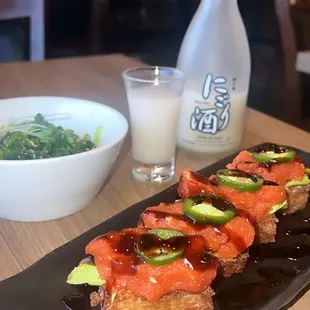 My absolute fav lunch time snack  crispy bites, seaweed salad &amp; a tasteful nigori