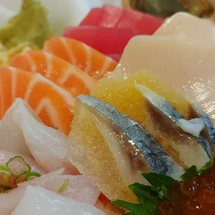 a close up of a variety of sushi