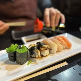 a plate of sushi on a table