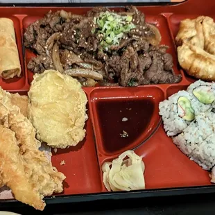 a bento box of food