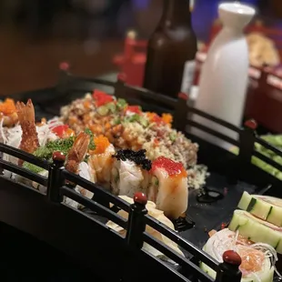 a variety of sushi on a tray