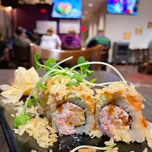 June 2023 Roll of the Month: Dracula Roll = California roll with tempura flakes &amp; shrimp. Can&apos;t taste avocado or salmon. Grassy microgreens.
