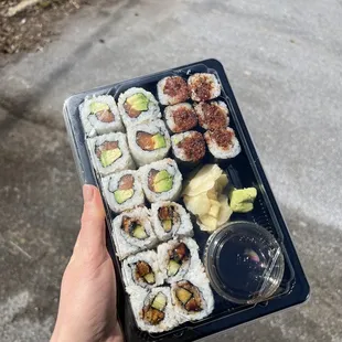 Maki rolls: salmon avocado, spicy tuna, and eel cucumber