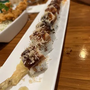 a plate of sushi on a table