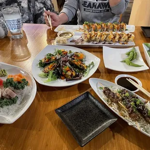 spicy salmon roll, spicy crunchy tuna roll, sashimi set, mussels, edamame &amp; grilled meat on a stick...all sooo yummy...happy tummy!