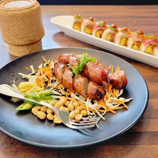Laos sausage and the Mendez sushi roll - love them both, but together they make for a spicy meal!