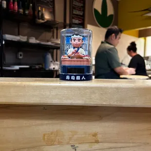 a picture of a man in a restaurant