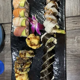 Yellow Brick Roll, Rainbow Roll, Shrimp Tempura Roll, and BBQ Beef Roll