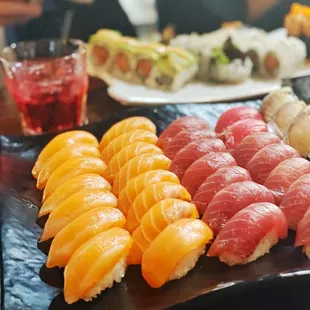 a variety of sushi on a tray