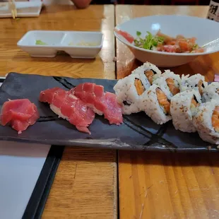 a sushi platter with a variety of sushi