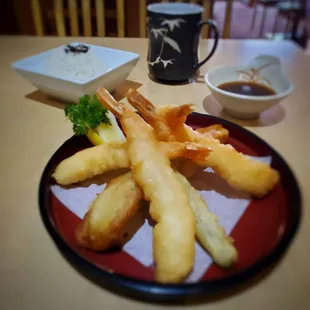 Shrimp and vegetable tempura meal comes with salad, soup, rice, dipping sauce. Stash mint tea soothing.