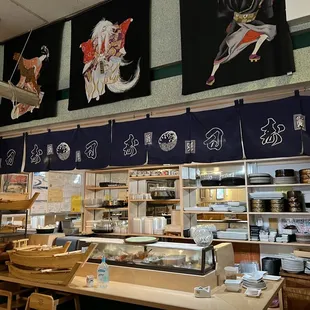 the interior of a sushi restaurant