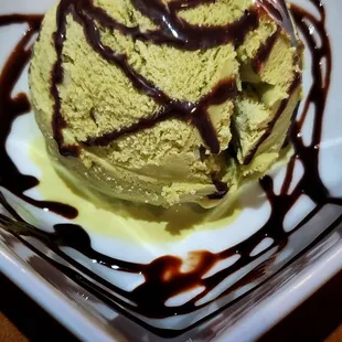 Green tea ice cream with chocolate syrup. Don&apos;t know the calories but so good!