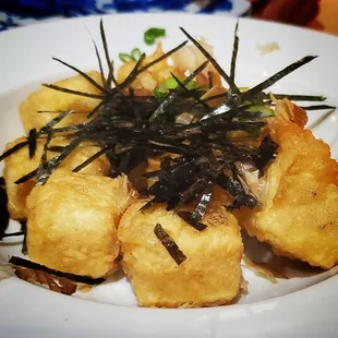 Agedashi tofu. Best compared to other restaurants. Comes with dipping sauce.