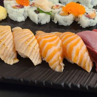 Eel, seared salmon, salmon, yellowtail, and bluefin tuna nigiri
