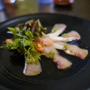 Such delicious, truffle oiled, melt in your mouth, hamachi yellowtail sashimi
 w/ fresh kizami wasabi on top 
 
 Instagram @sushiking707