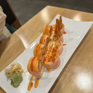 LSU rolls with Soybean paper and sweet chili sauce. Presentation beautiful. Taste, not to my liking.