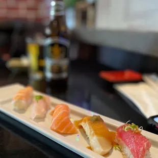 a plate of sushi on a table