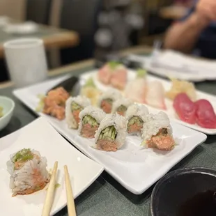 a variety of sushi on plates