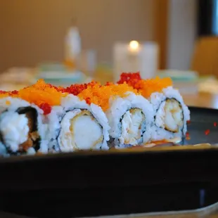 a plate of sushi on a table