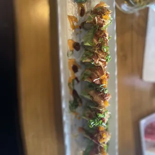 a plate of sushi on a table