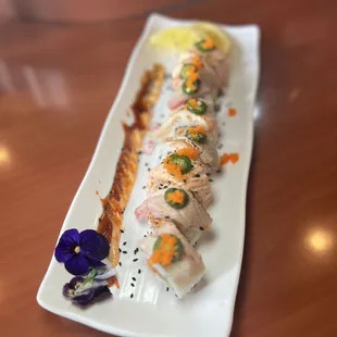 a plate of sushi on a table