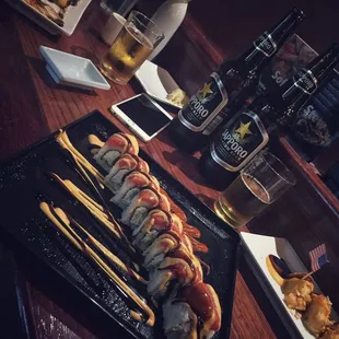 Hawaiian Roll  Our #SecretMenu Special Bad Boy Roll  Sapporo Sake  #deliciousnessssssss