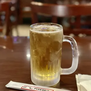 a mug of beer on a table