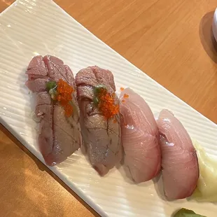 a plate of sushi on a table