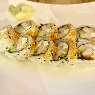 a plate of sushi on a table