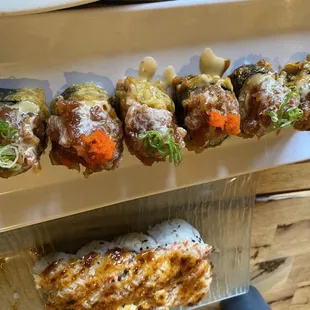 a variety of sushi rolls