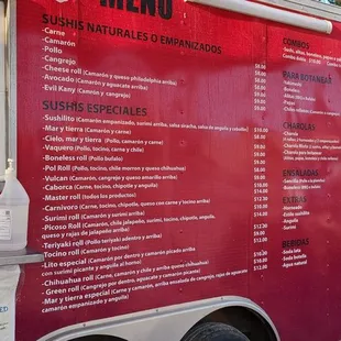 the menu on the side of a food truck
