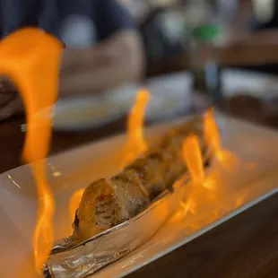  a plate of food on fire