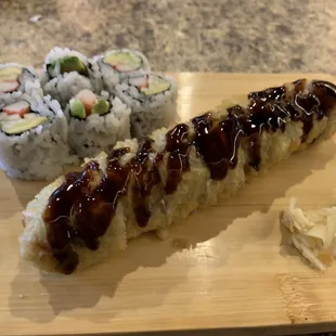a plate of sushi and a bowl of sushi